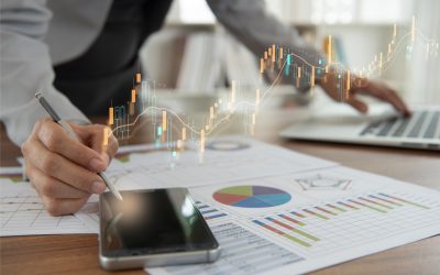 businesswomen using digital tablet for analysis investment portfolio in stock market with index stock market and chart with uptrend stock market graph.