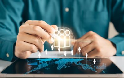 HRM human resource management concept, executive holding a magnifying glass to search for effective personnel, human resource management in the organization, human development and recruitment.