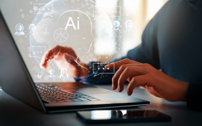 Computer and hands close up. The concept of artificial intelligence and computer technology.