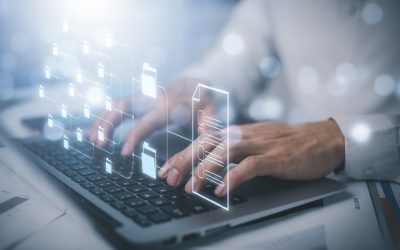Businessman working on laptop with virtual screen. Online documentation database, IT consultant being set up Virtual Document Management System with laptop,Software for archiving corporate files.