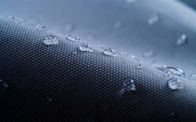 Macro shot of water rain drops on waterproof textile jacket. Extreme depth of field. Please visit my portfolio for different shots of this subject.